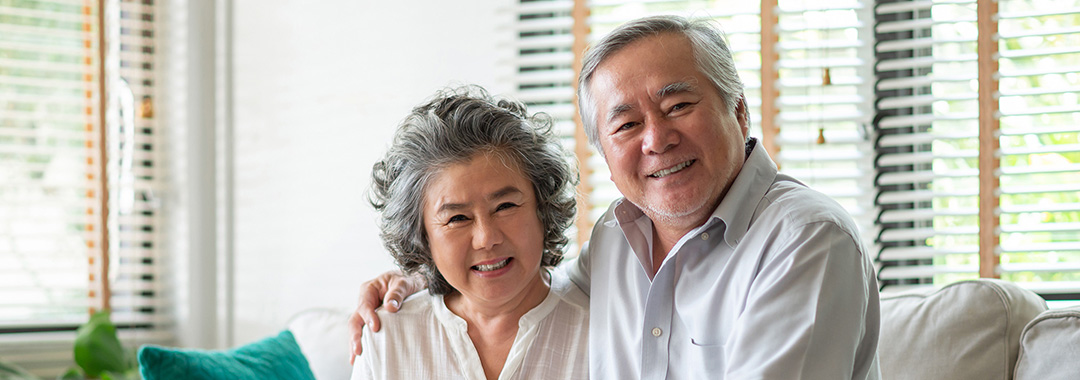 yolo-1080x380-4 An elderly couple in their home smiling